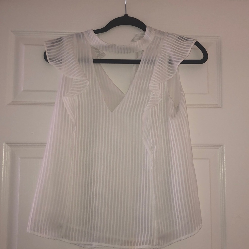 White flutter sleeve blouse